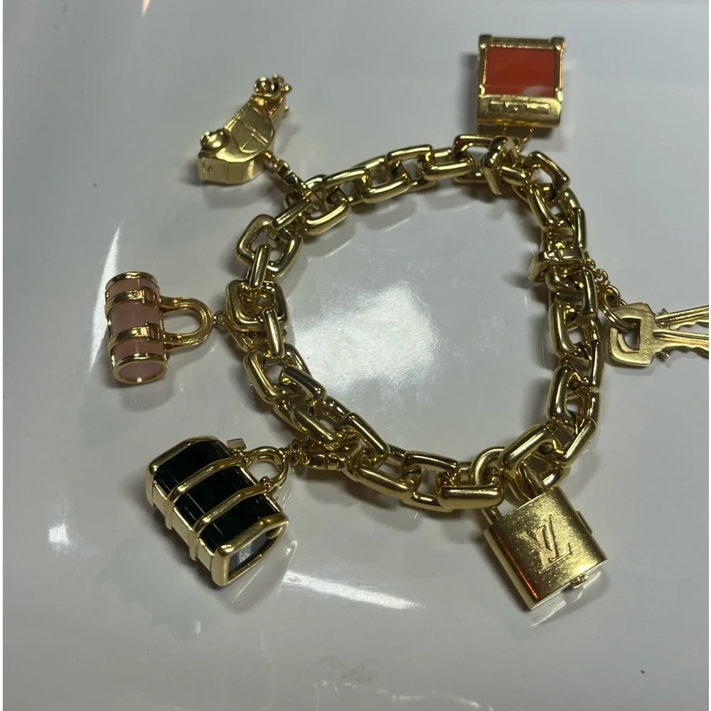 LOUIS VUITTON 2003 18KT GOLD CHARM BRACELET W/ 5 CHARMS - Picture 14 of 14